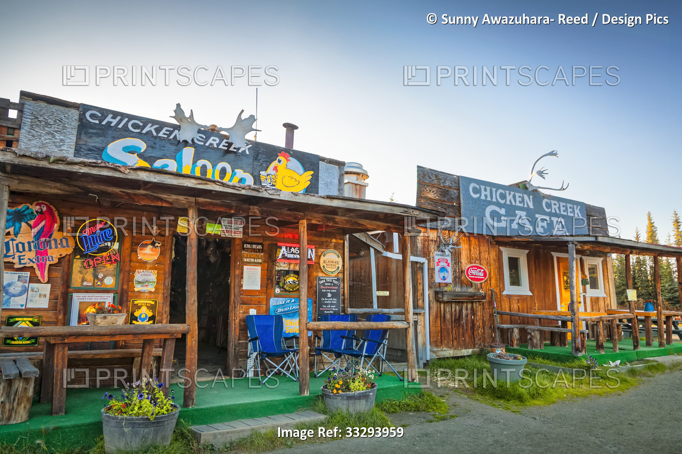 Rustic log buildings of Chicken Creek Saloon and Chicken Creek Cafe at Downtown ...