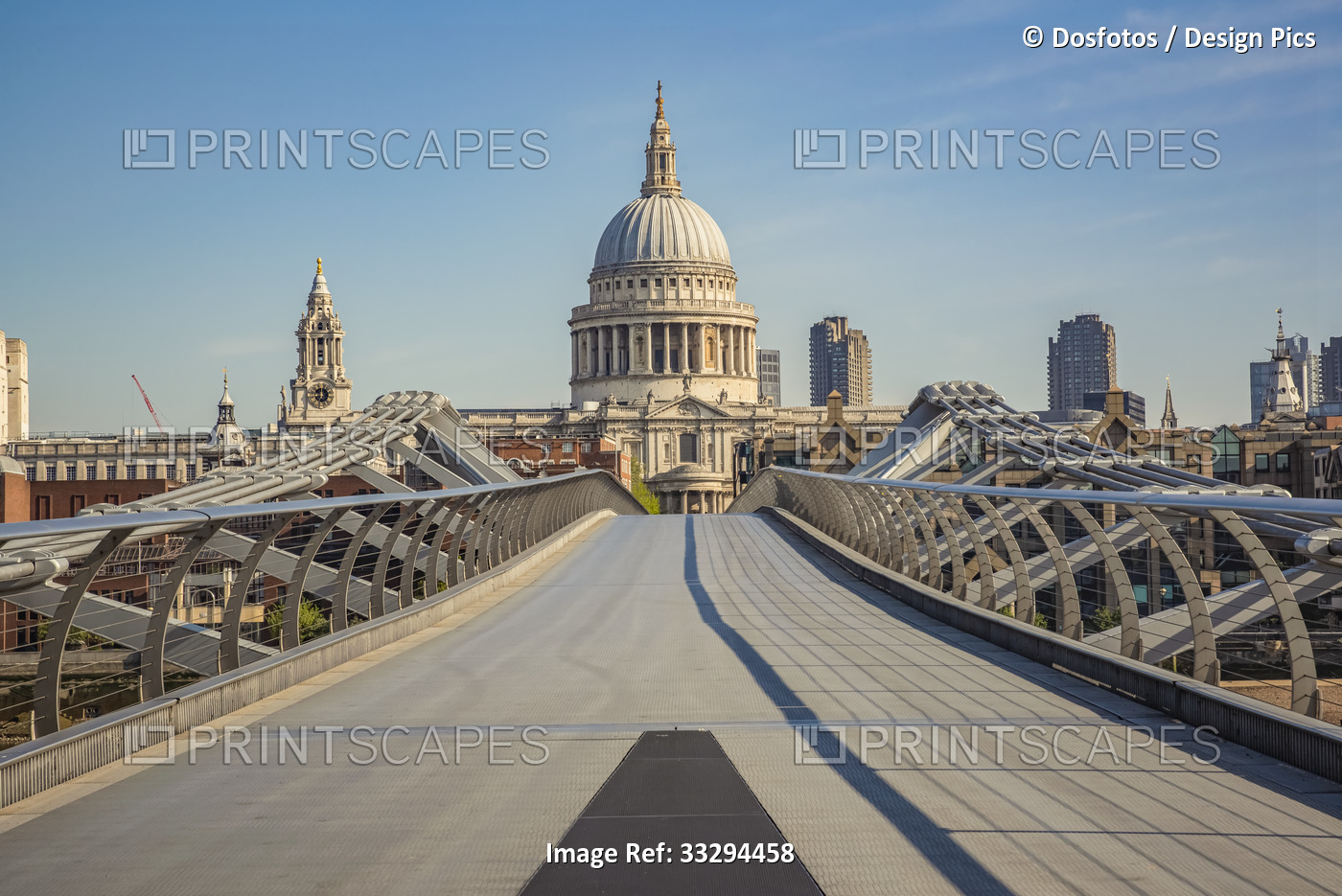 Millennium Bridge at morning rush hour looking towards St. Paul's Cathedral ...