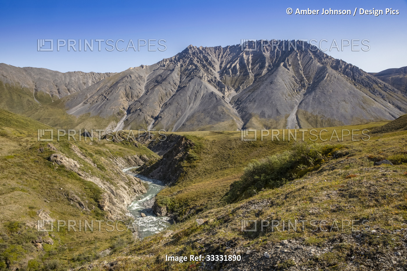 River flowing through the Brooks Range mountains on a sunny day in late summer, ...