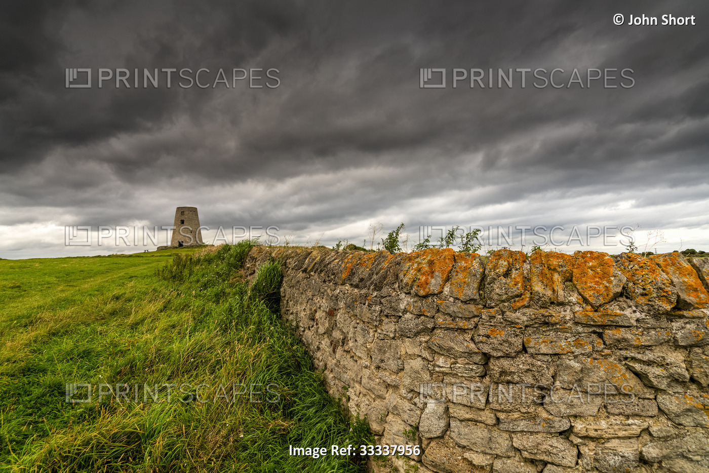 Stone wall leading to the Cleadon Windmill ruin, built in the 1820's at the the ...