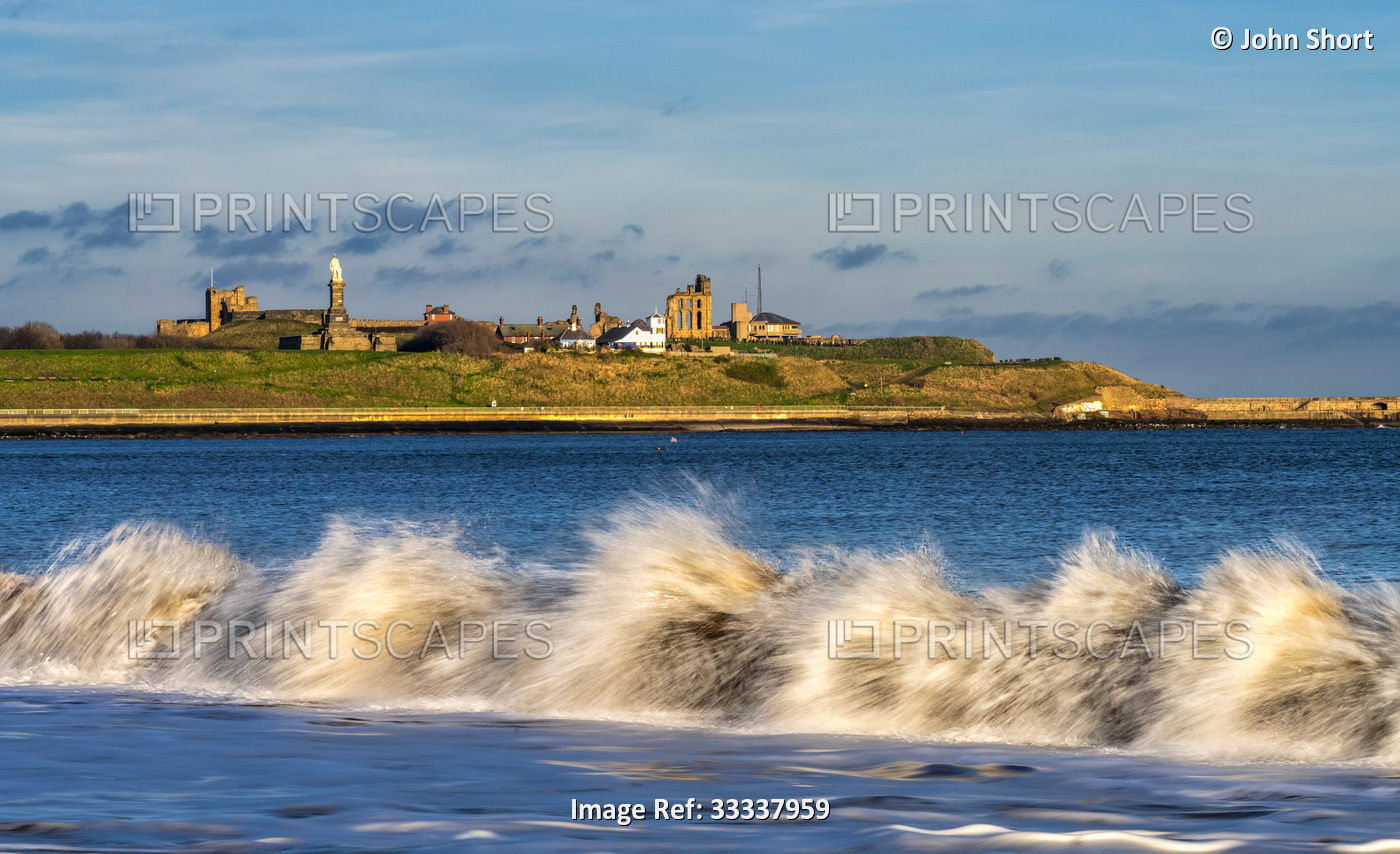 North Sea waves breaking on the shore of South Shields with the historic ...