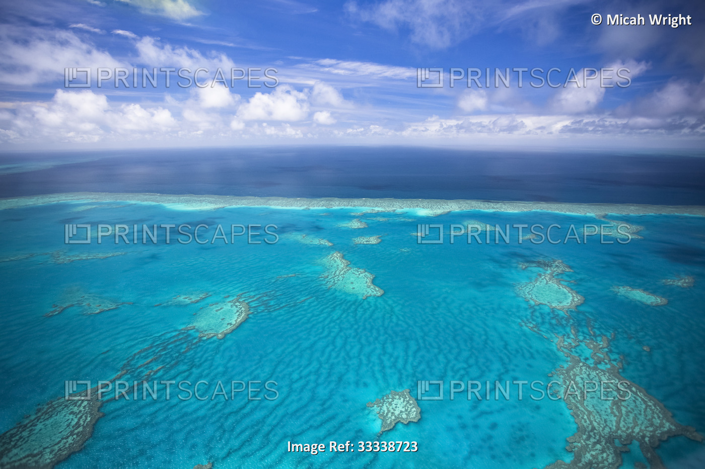 Aerial views over the Whitsunday Island chain and the Great Barrier Reef; ...