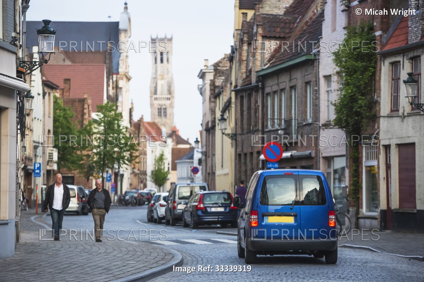Camper van on road trip traveling through Old Town of Bruges; Vlaams Gewest, ...