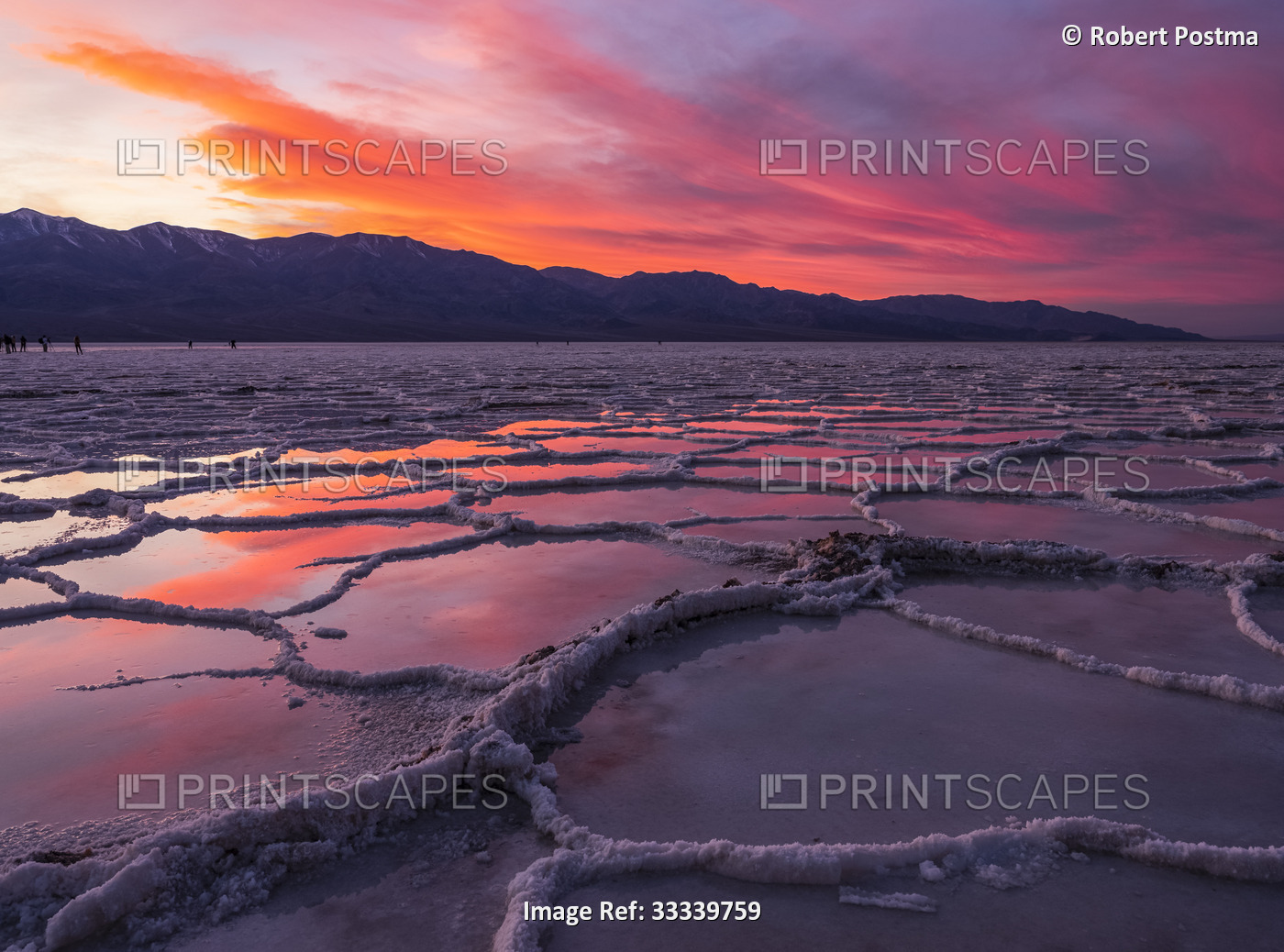 Sunset over the Badwater salt flats on Death Valley National Park; California, ...