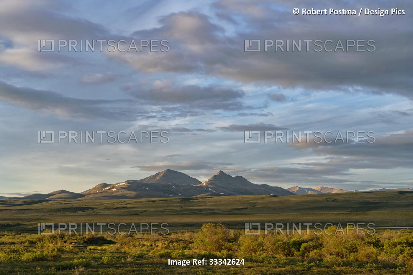 Autumn landscape with mountains on the horizon in the golden light of the ...
