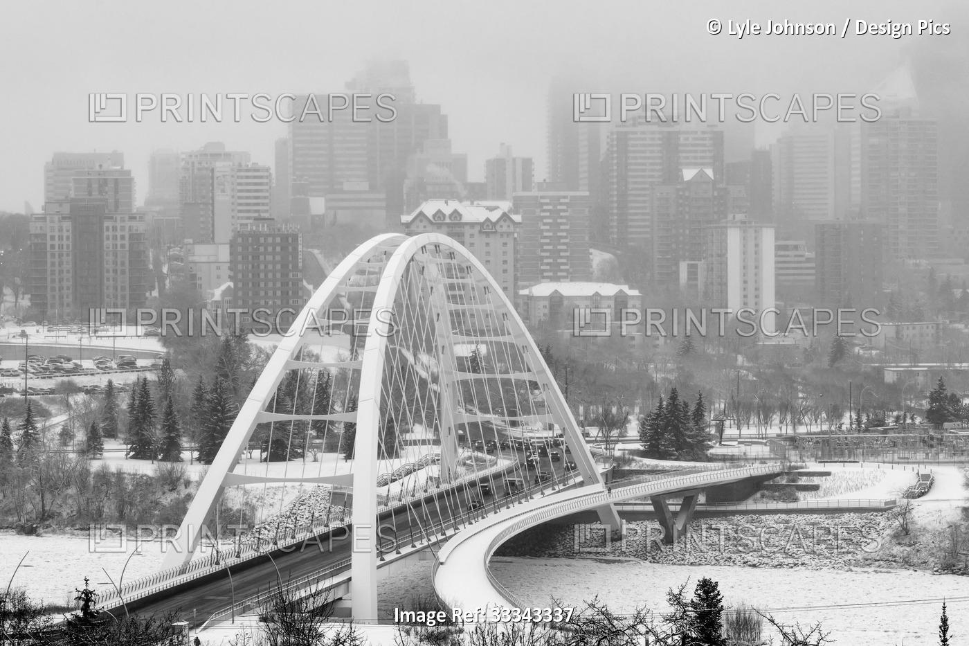 Walterdale Bridge crossing the frozen North Saskatchewan River in the city of ...