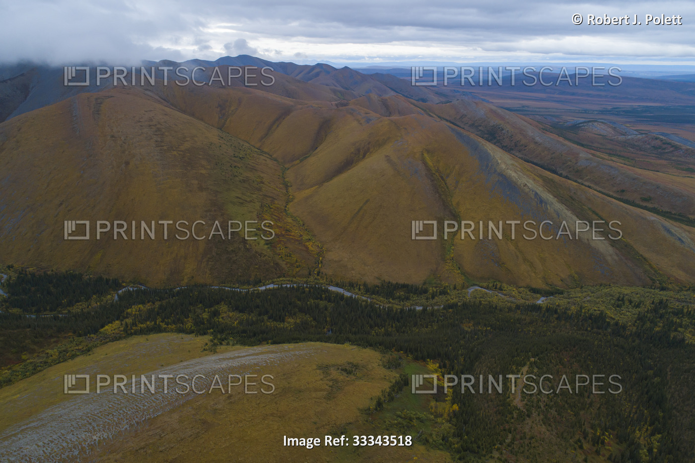 Aerial view of the fall colors of the vegetation on the Richardson Mountains ...