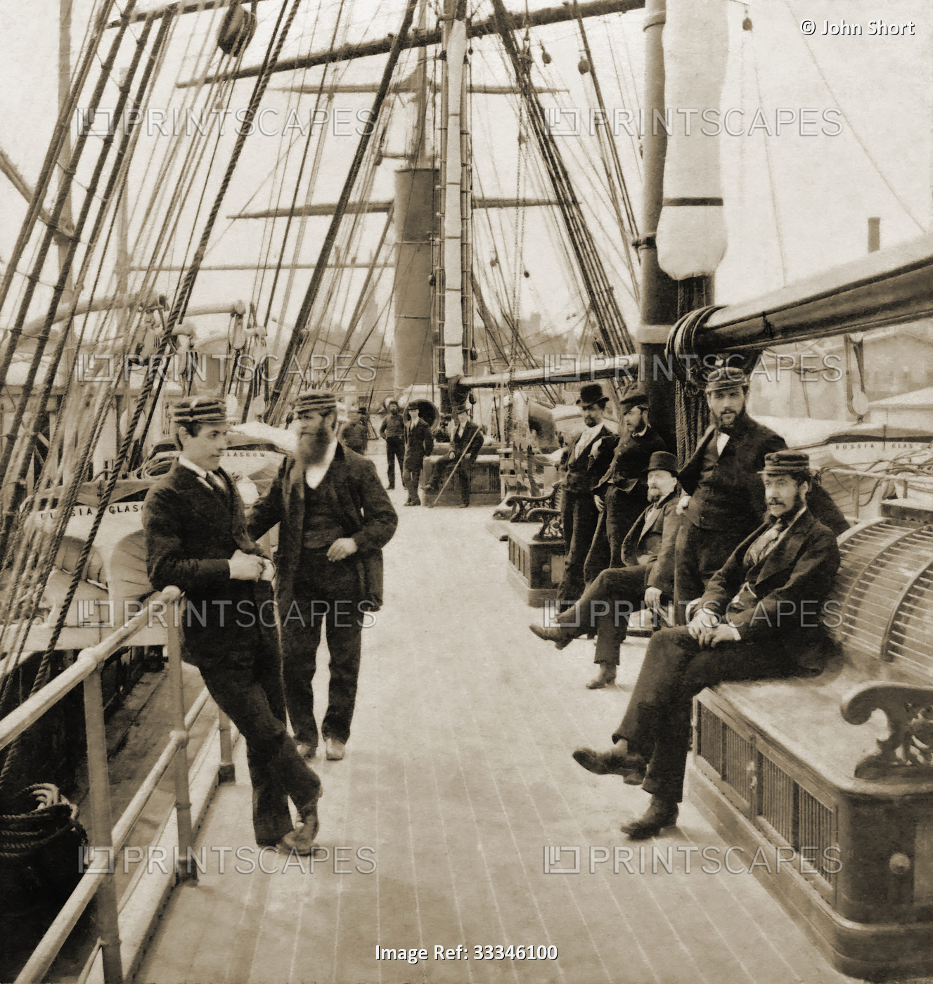 Historic image in sepia of the crew aboard the SS Russia, a Cunard liner built ...