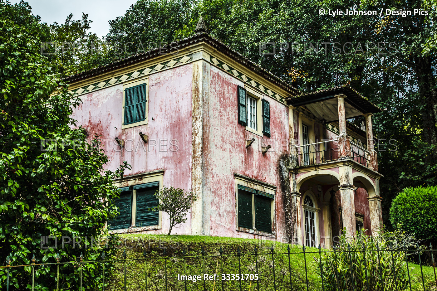 An old house with weathered pink facade; Furnas, Sao Miguel, Azores, Portugal