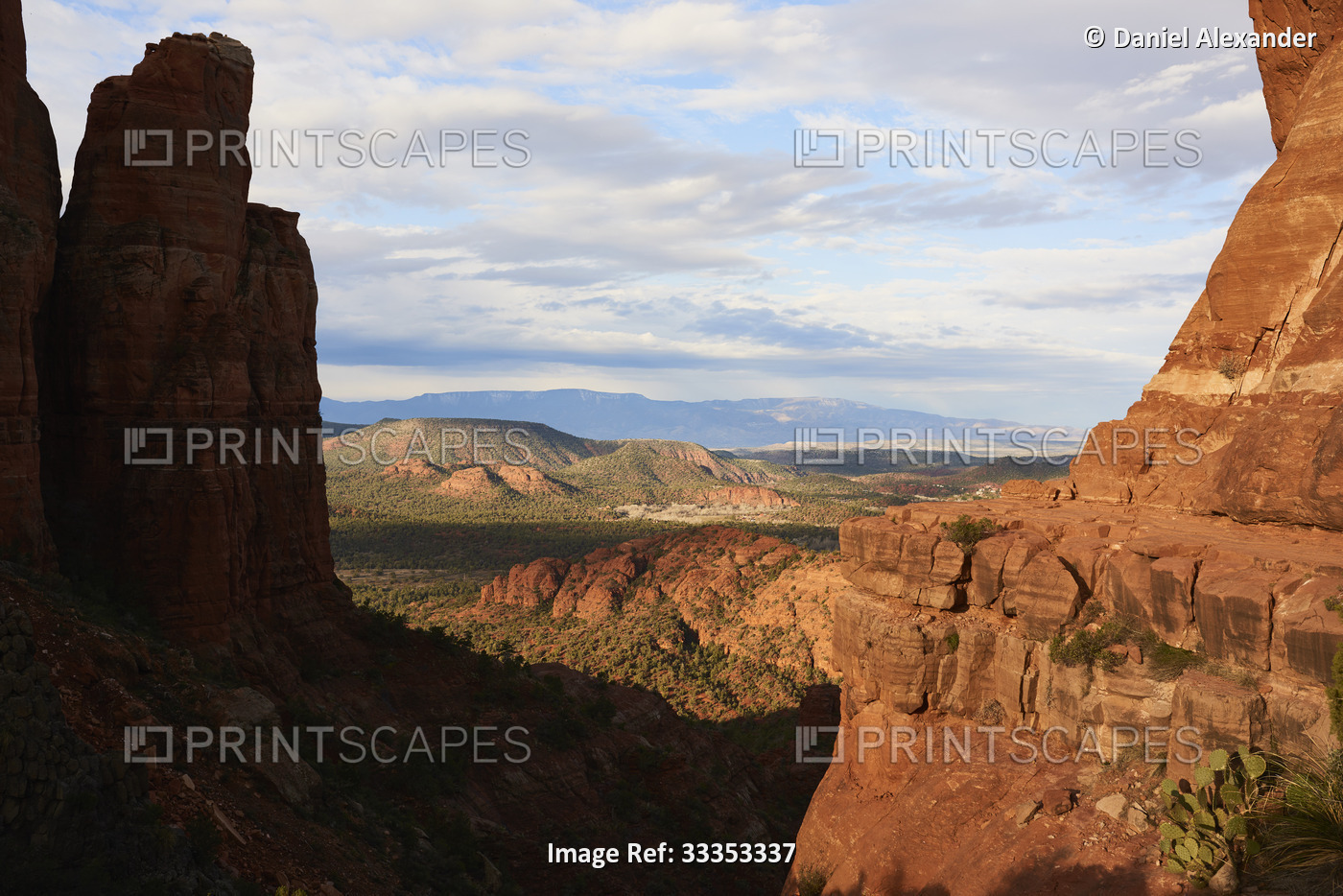Sweeping wide-angle view of Sedona landscape with red rock buttes and mountains ...
