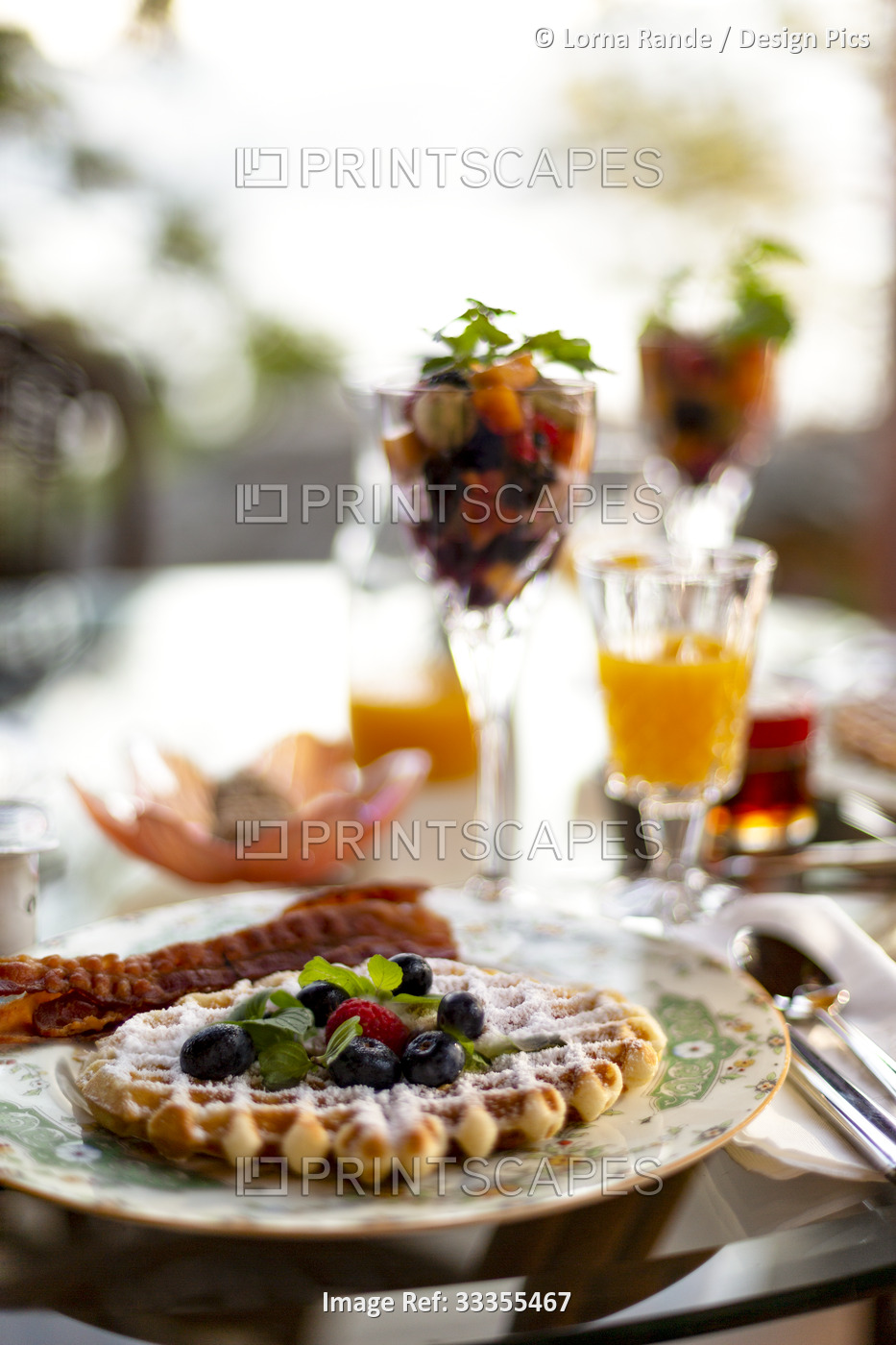 Breakfast served with stemmed glasses and colourful food items, Pineacre on the ...