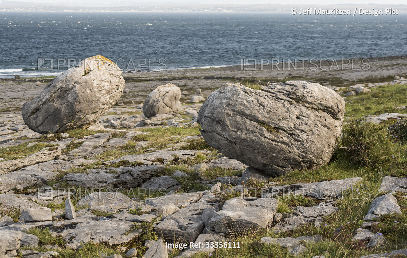 Ancient, erratics deposited by glaciers in the Burren; County Clare, Ireland