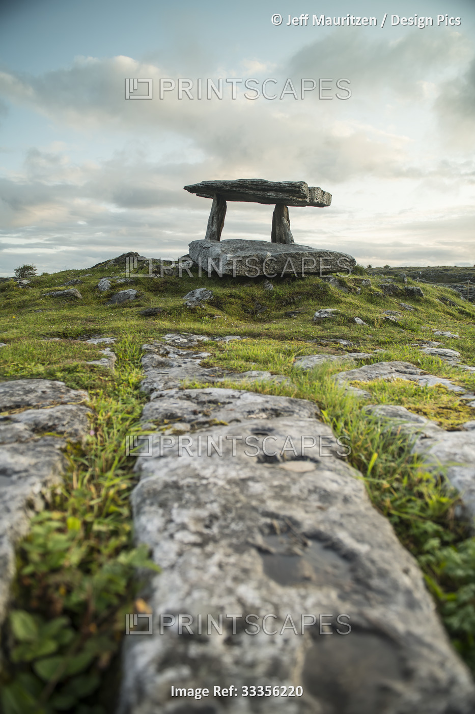 The rocky karst landscape leading to the portal tomb of Poulnabrone Dolmen with ...