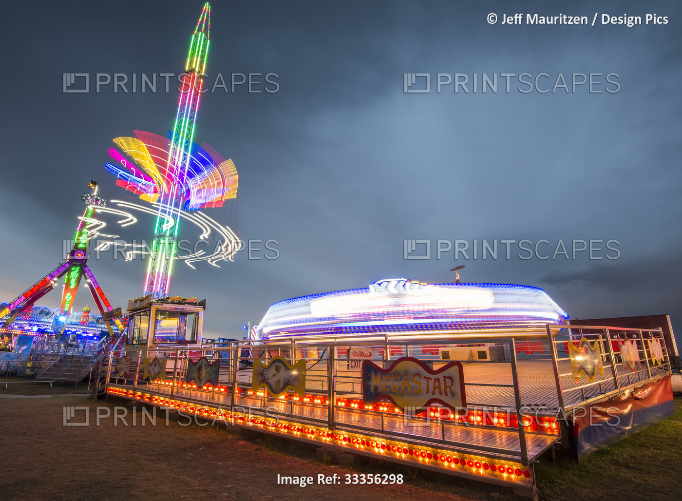 The carnival fun rides lit up at night; Bray, County Wicklow, Ireland