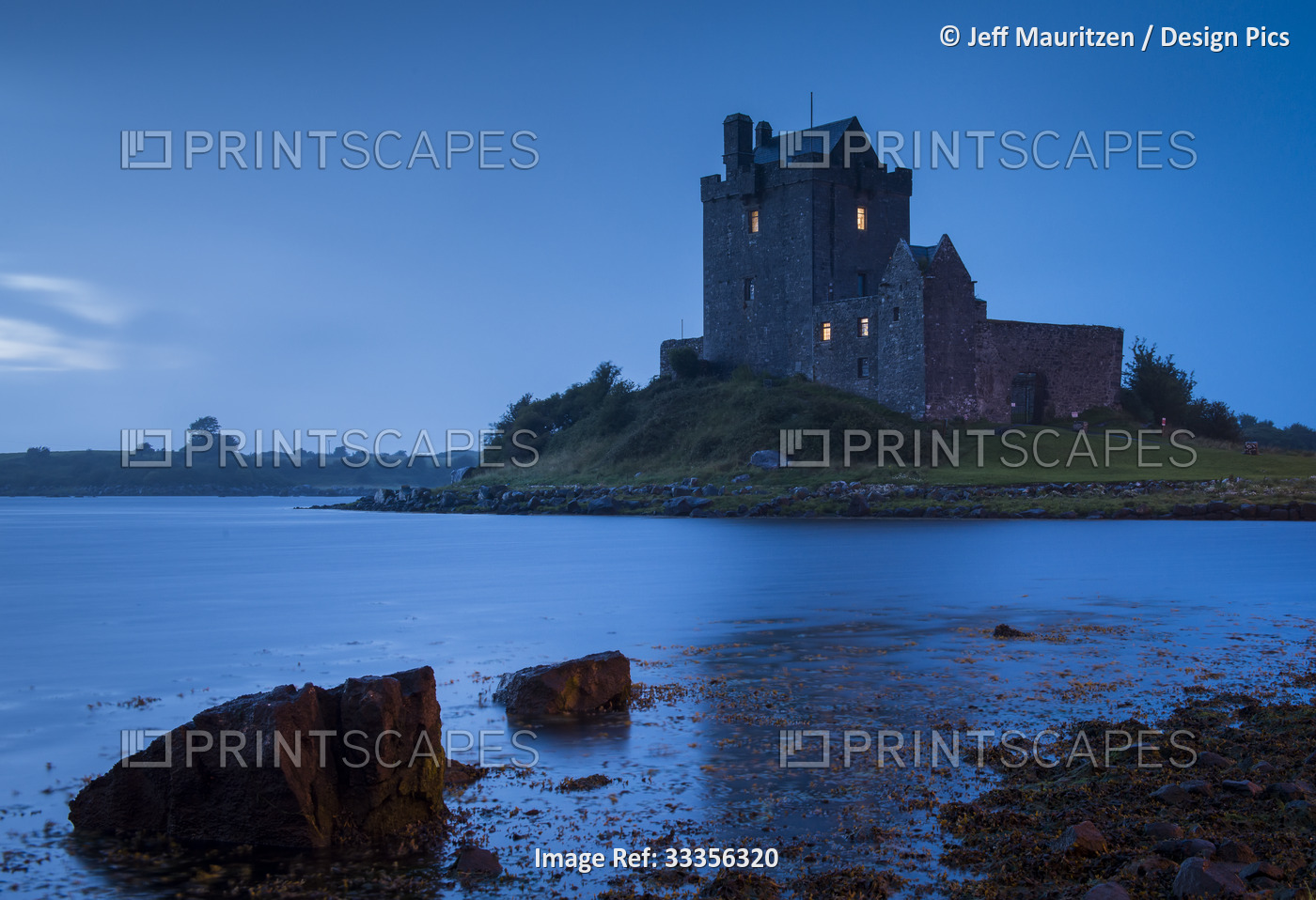Dunguaire Castle on the water's edge of Galway Bay; Kinvarra, County Galway, ...