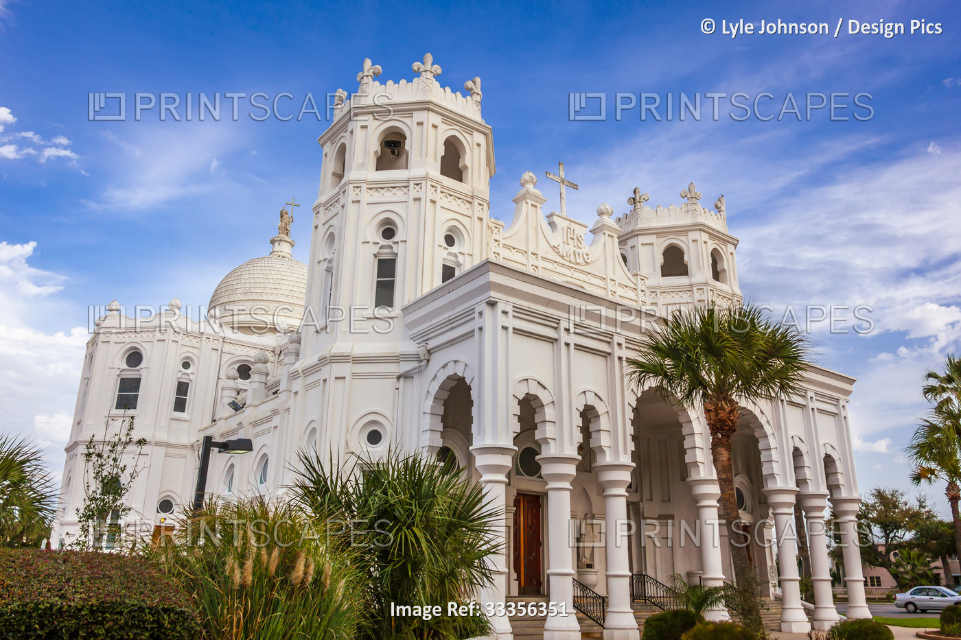 The white, stone facade of the Sacred Heart Catholic Church; Galveston, Texas, ...