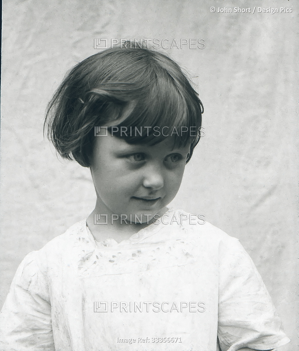 Portrait of the head and shoulders of a young girl in Victorian/Edwardian times