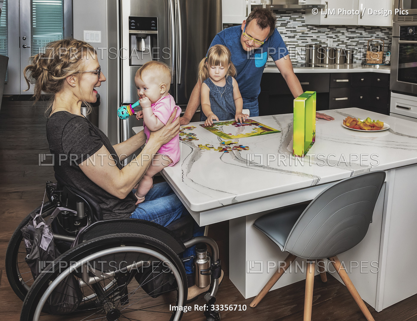 A paraplegic mother and her family making a puzzle and spending quality time ...