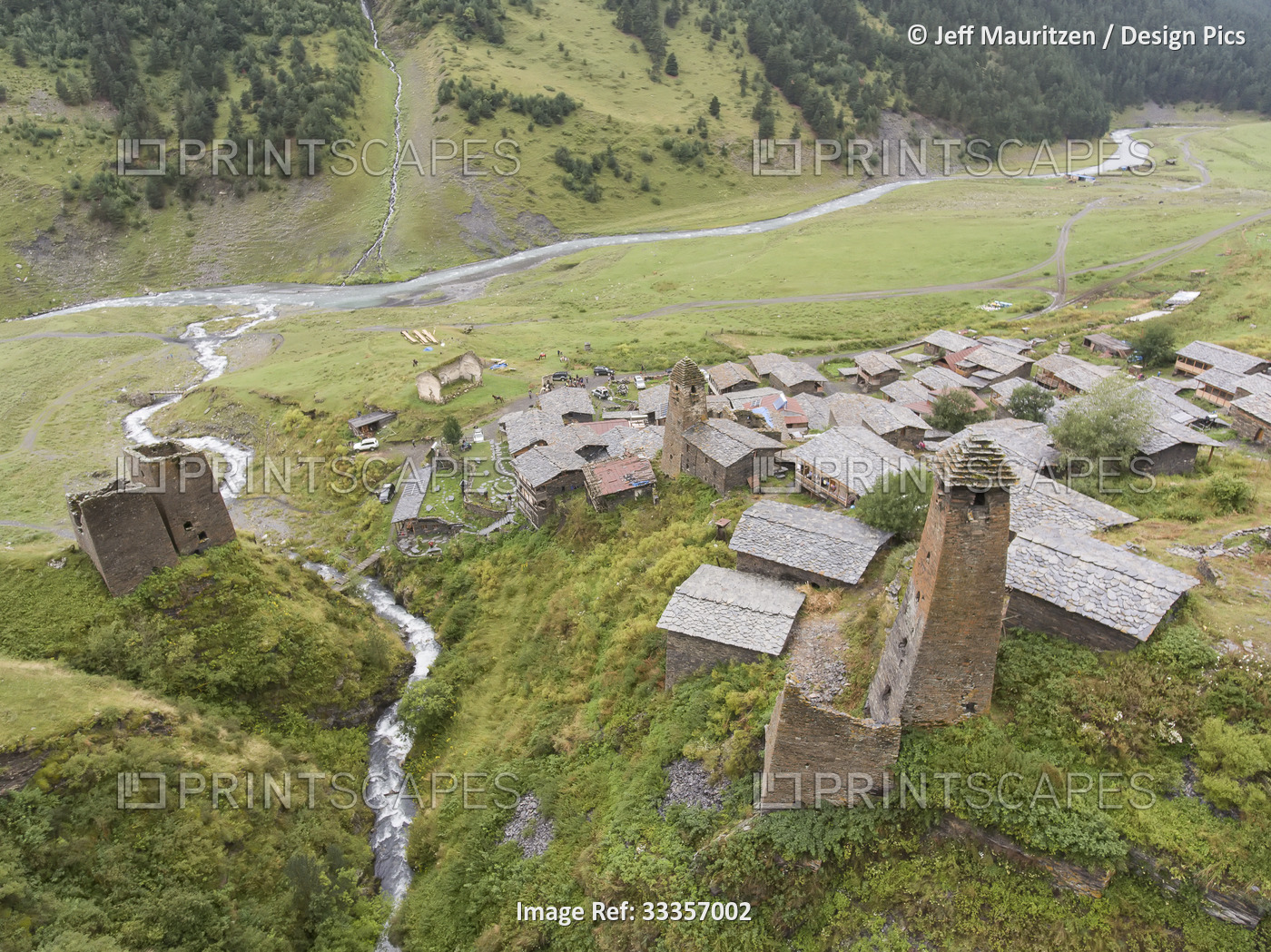 Aerial view of the mountainside village of Dartlo with a stream running next to ...