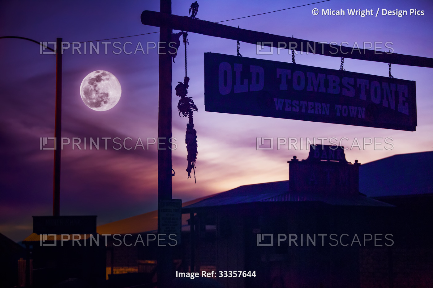 Silhouette of a skeleton hanging from the famed, western town of Tombstone with ...