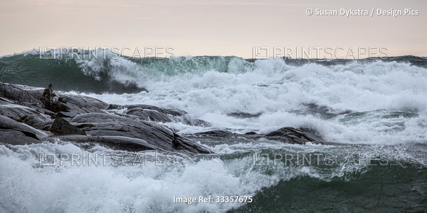 Crashing waves on Lake Superior at sunrise, Ontario, Canada