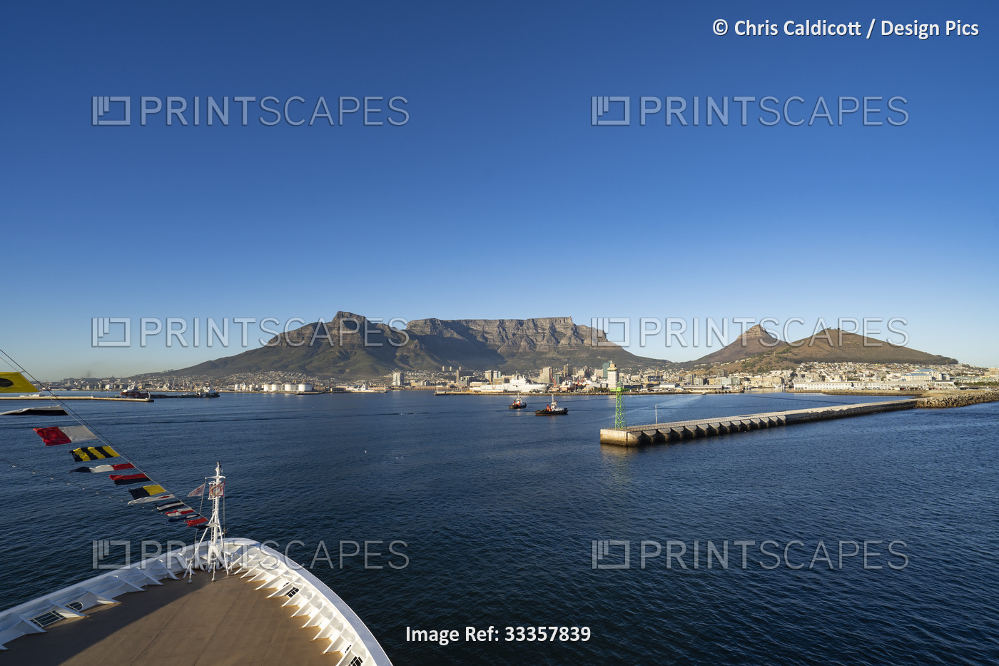 Close-up of the bow of a ship in Table Bay looking towards the Port of Cape ...