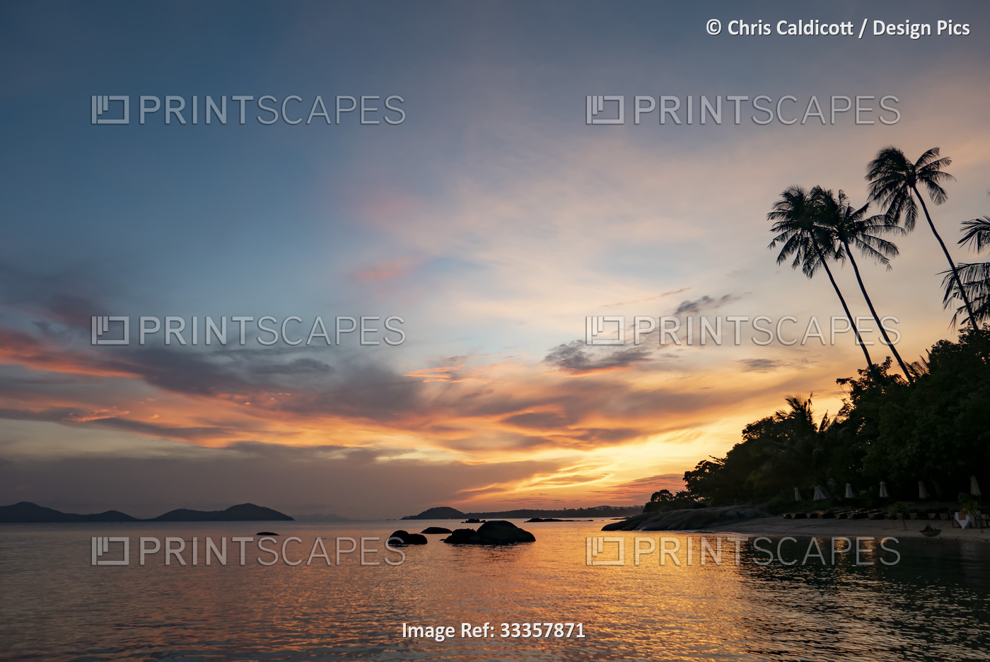 Sunset over the beach on Ko Samui Island in the Gulf of Thailand; Ko Samui, ...