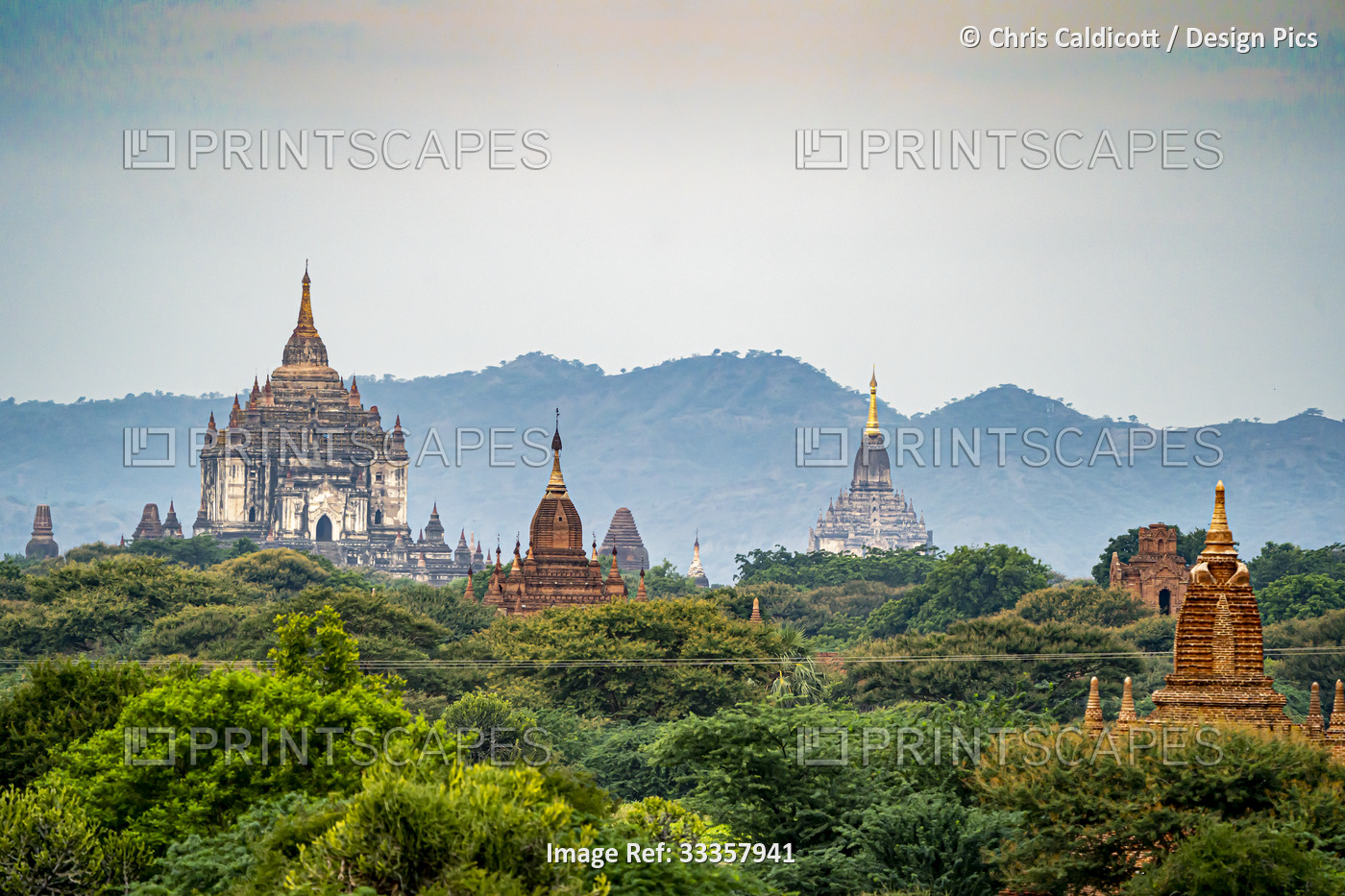 Thatbyinnyu Temple and pagodas in the morning light, displaying their ornate ...