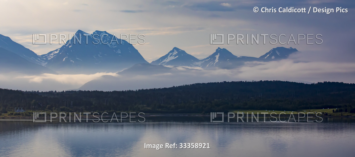 Summer landscape of mountains and islands in the Western Fjords of Norway; ...