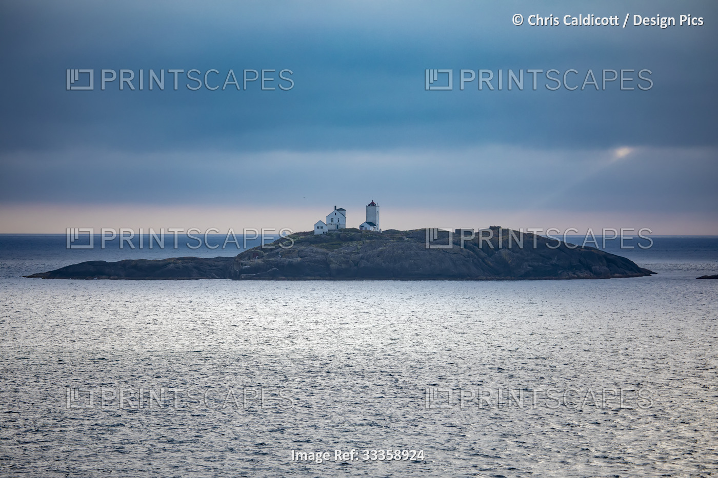 Terningen Lighthouse at twilight on a remote island in the Municipality of ...