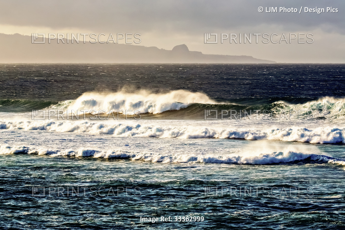 Seascape of waves breaking from a lookout at Ho'okipa Beach Park, with a view ...