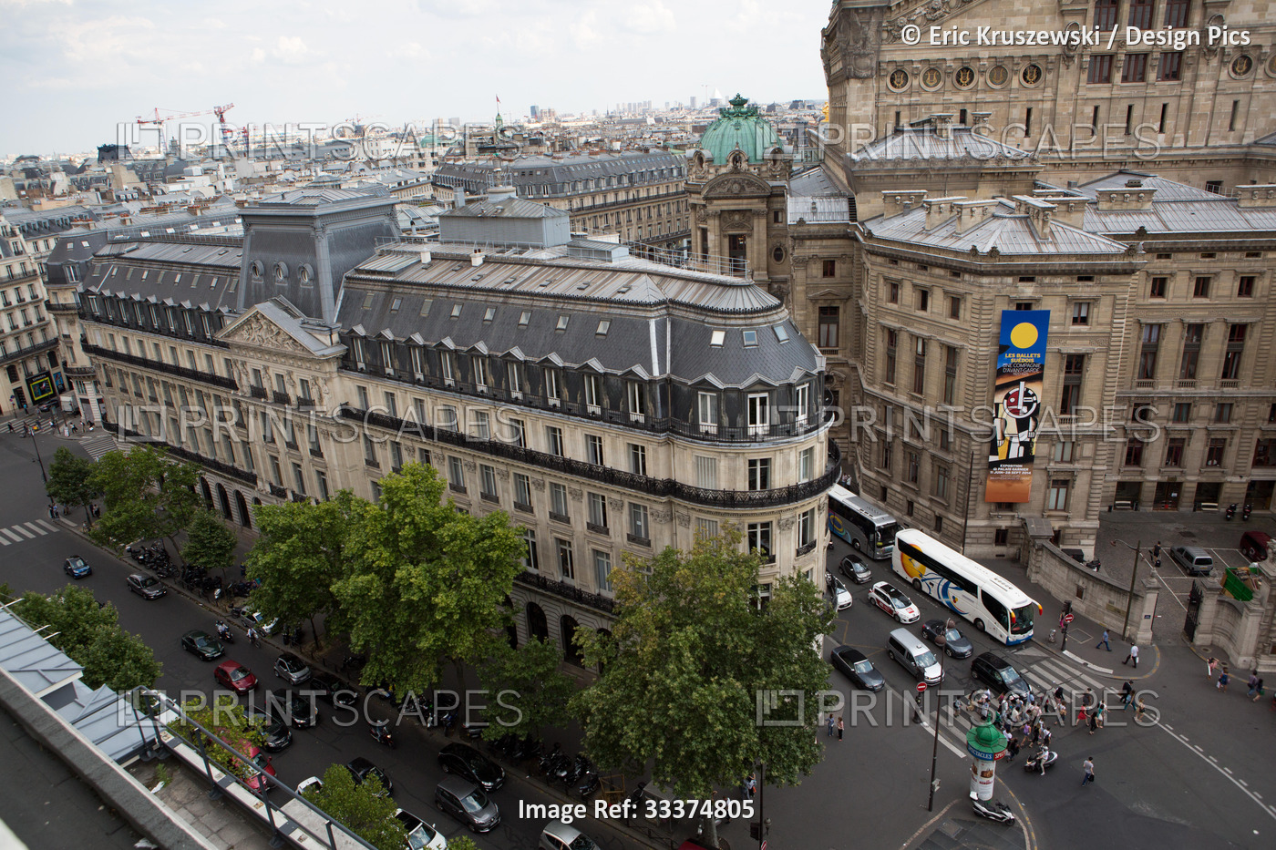 Traffic and pedestrians fill the roads near the Paris Opera House, Garnier ...