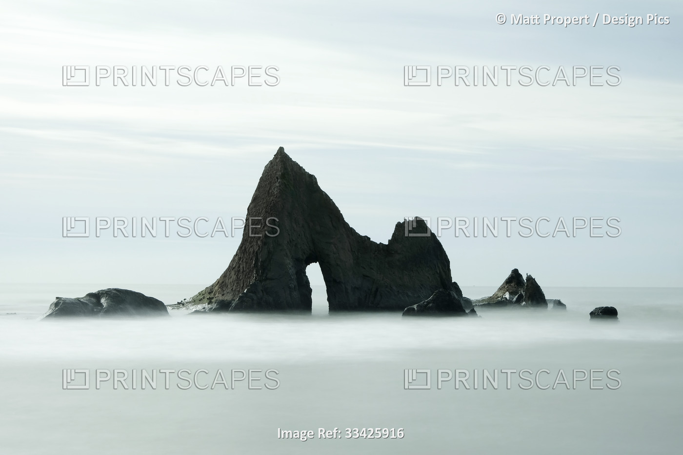 Dramatic rock formation of Pelican Rock at Martin's Beach near Half Moon Bay, ...
