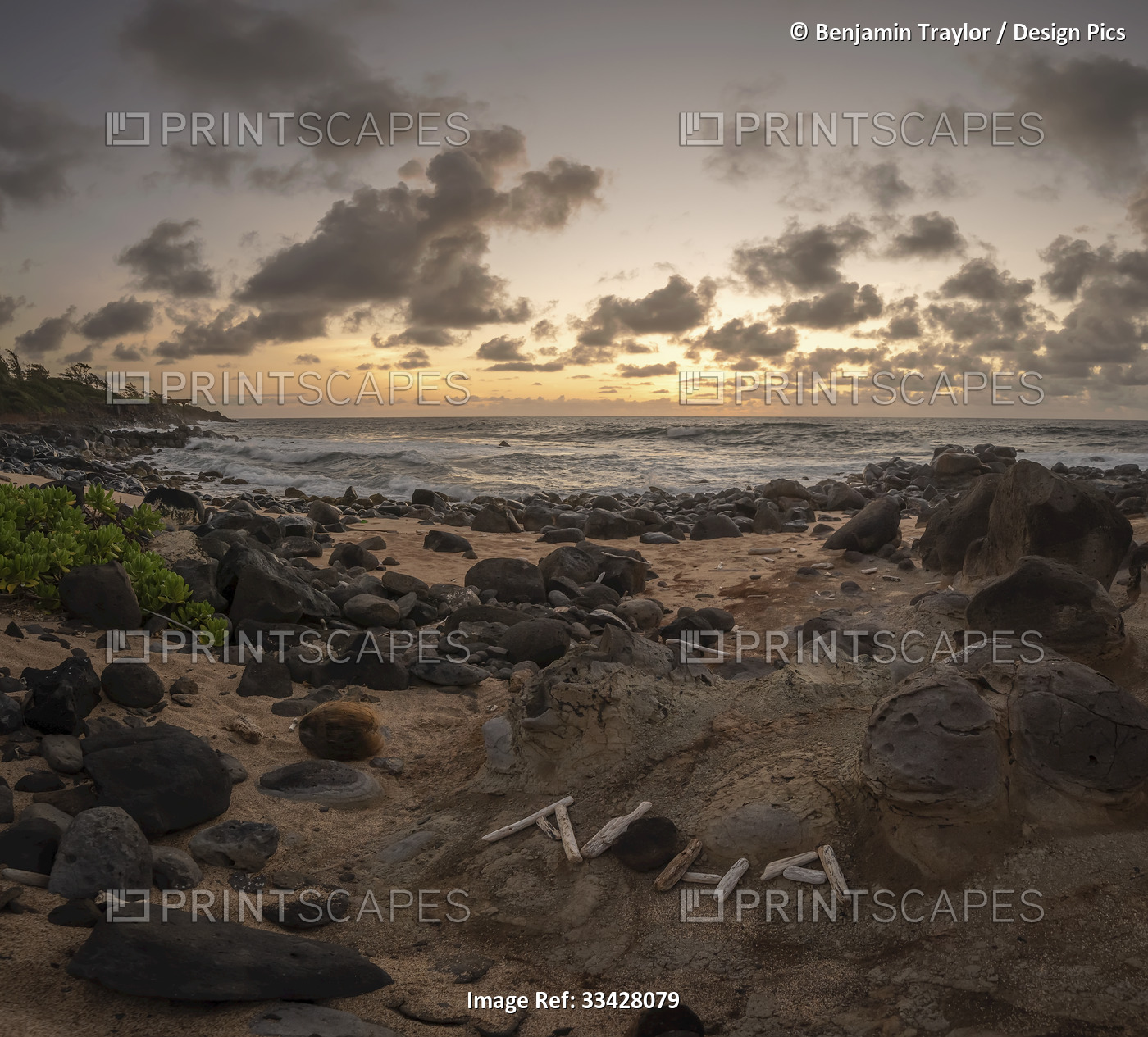 Lava rocks on the sandy beach along the Kauai Multiuse Trail (Ke Ala Hele ...