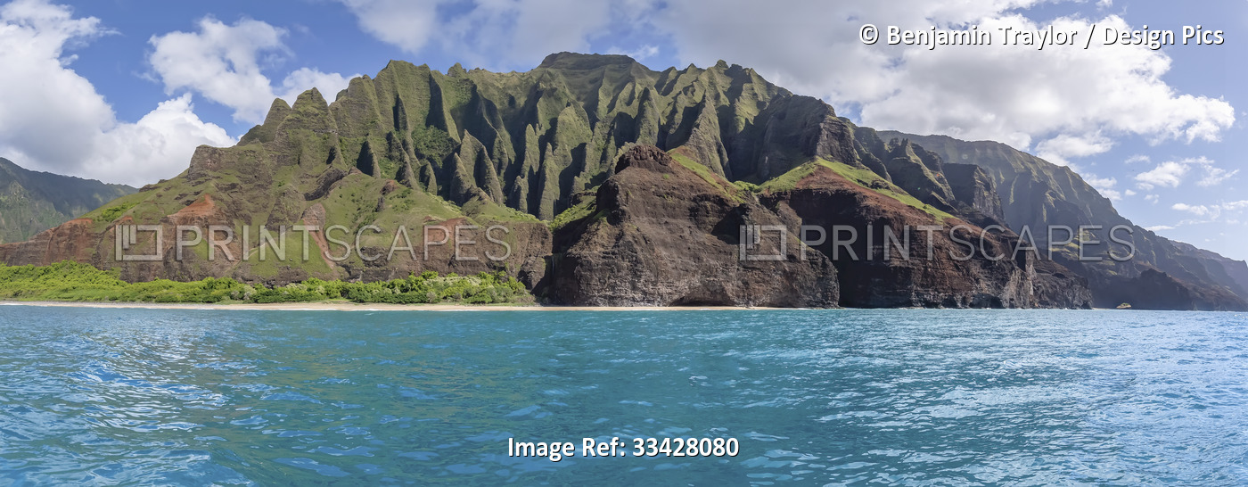 Na Pali Coast with ancient, natural rock formations and the turquoise water of ...