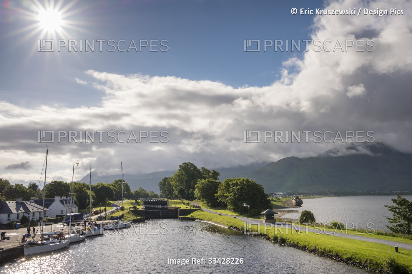 The sun shines over the landscape along the Caledonian Canal near Corpach, ...
