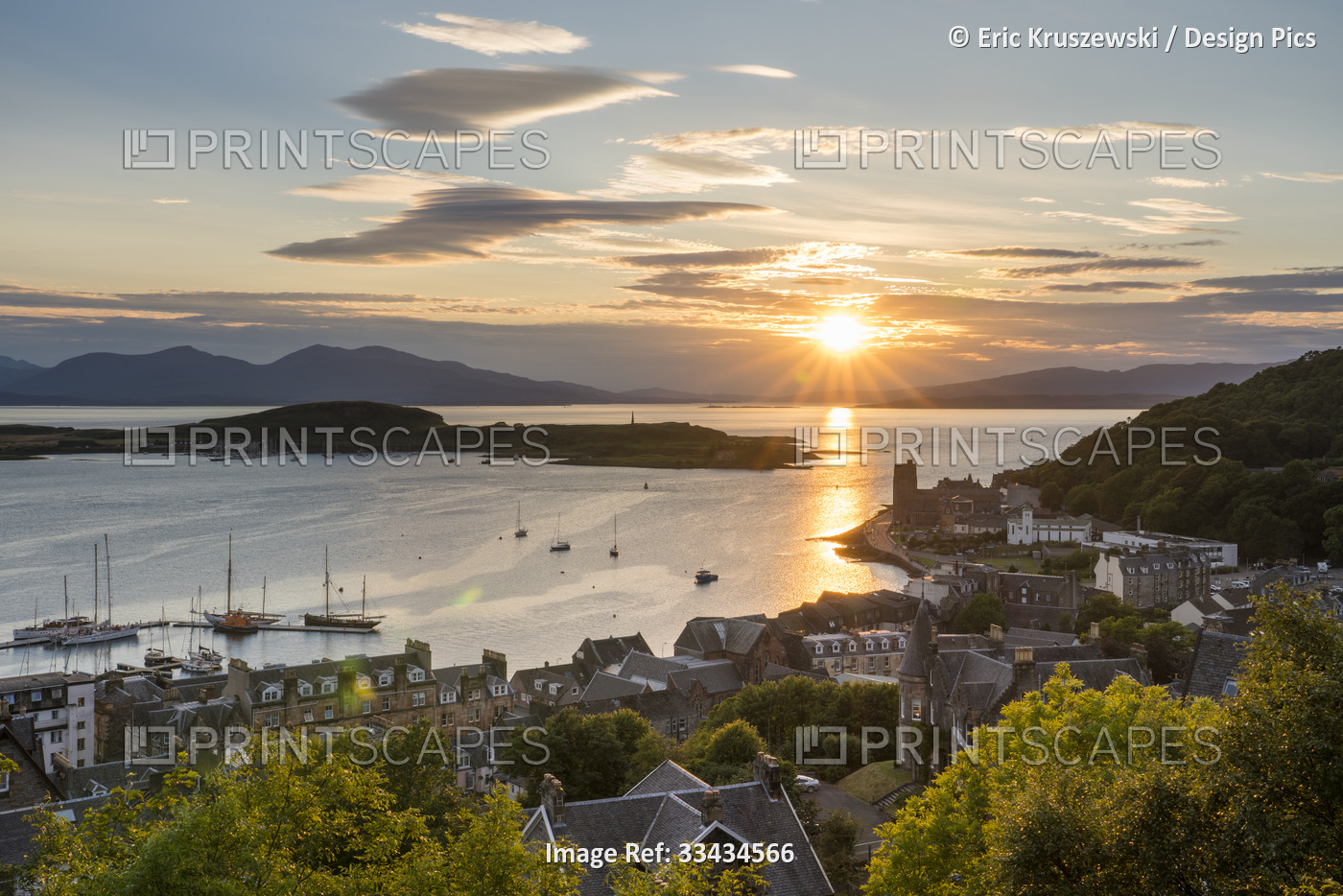 The sun sets over the harbour waters of Oban, Scotland; Oban, Scotland