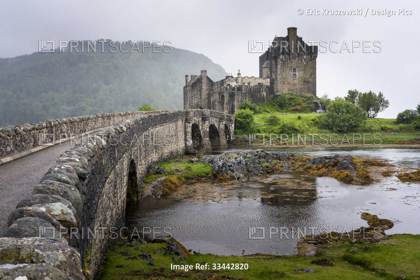 A view of Eilean Donan Castle and its causeway bridge in Kyle of Lochalsh, ...