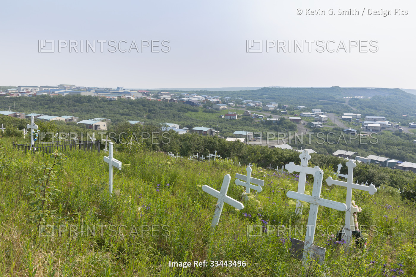 Crosses mark the village graveyard on the hill overlooking Mountain Village in ...
