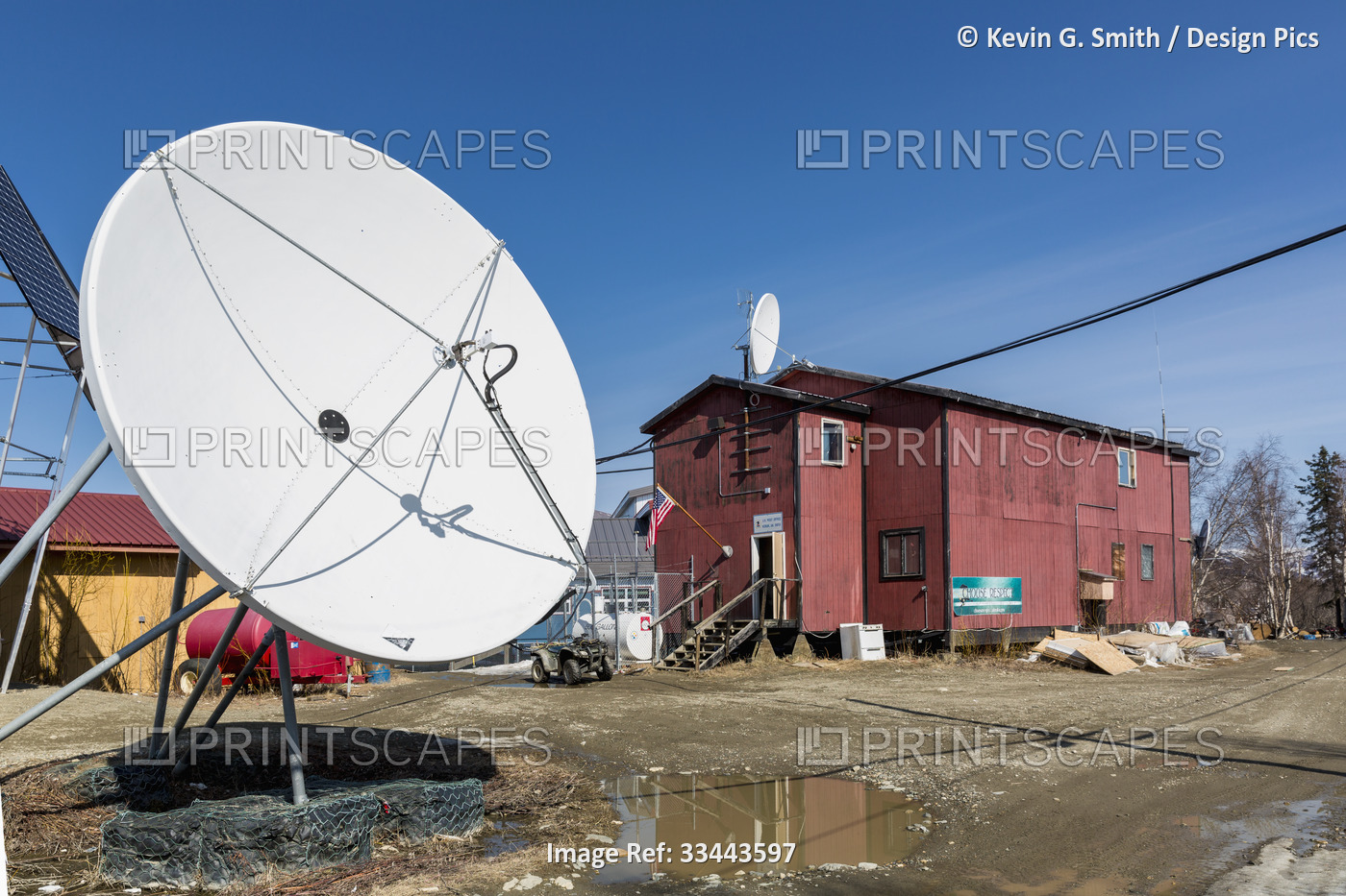 Satelite dish sits outside the post office in the native vilage of Kobuk in ...