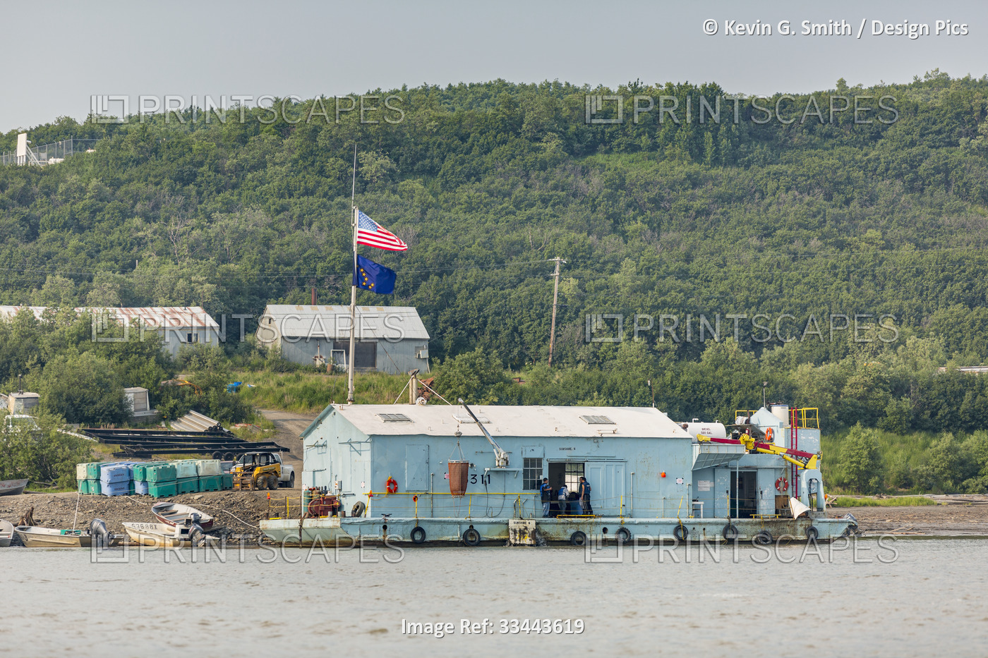 Yukon River fishing boats on the beach in front of Kwik Pak Fisheries floating ...