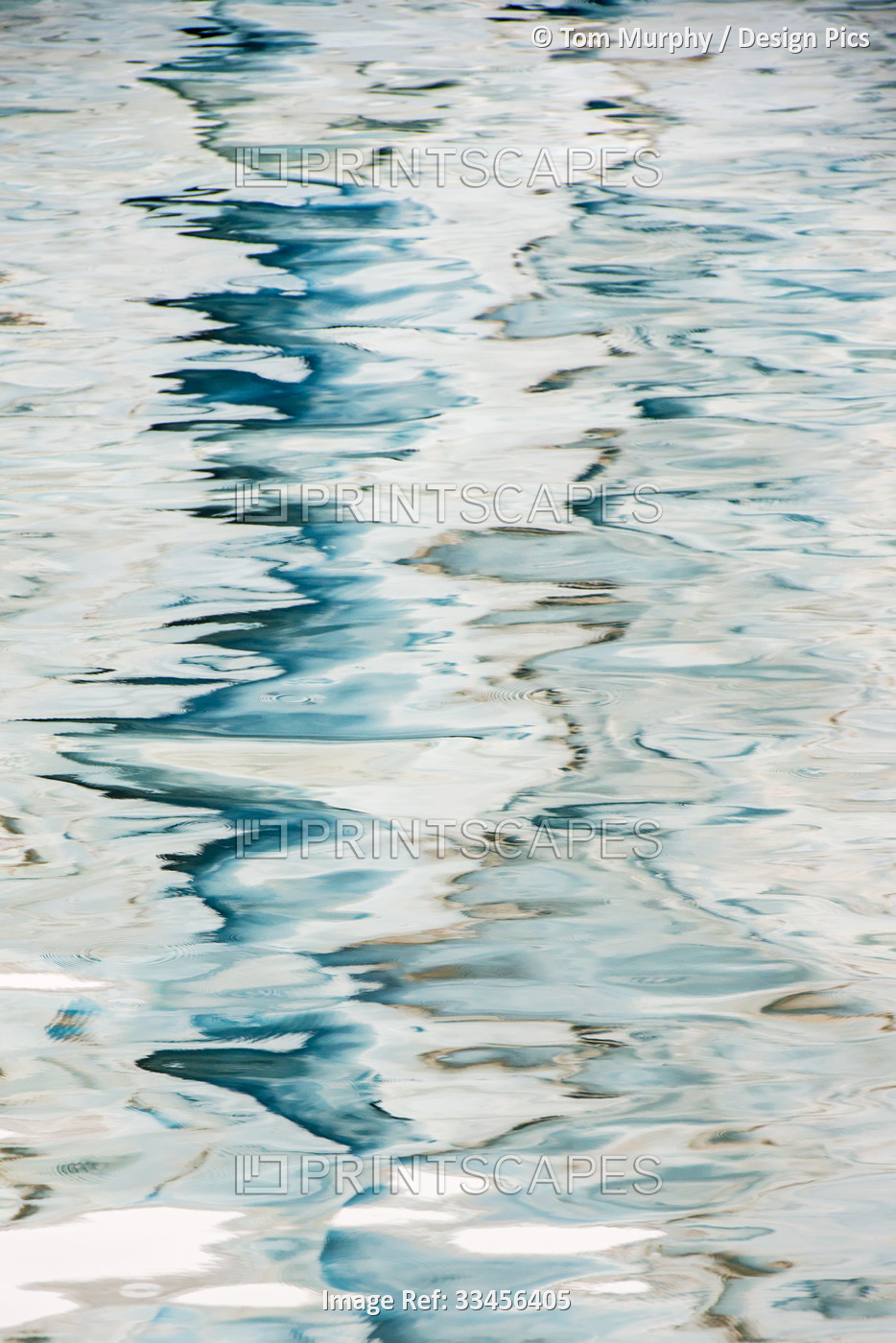 Abstract patterns on a watery surface with icy and wavy reflections; South ...