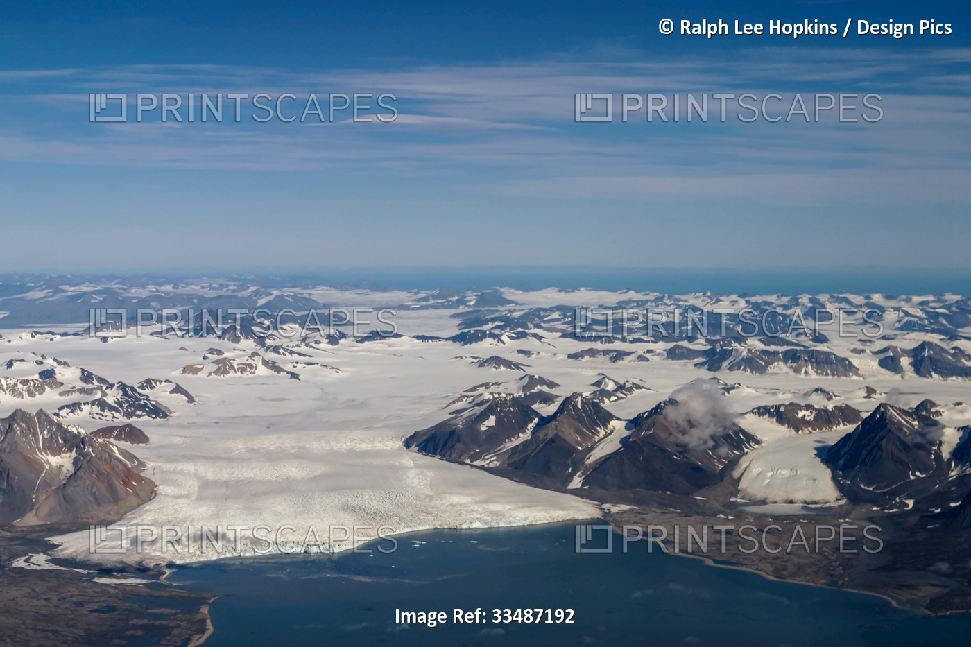Aerial of tidewater glacier and fjord, Spitsbergen, Svalbard, Norway.