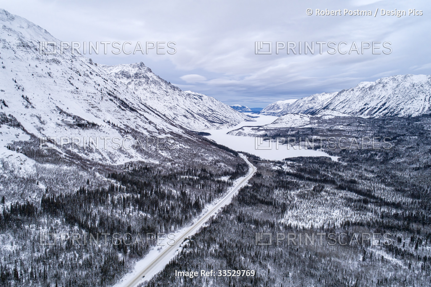 The South Klondike highway winds its way through the wintry Yukon landscape ...