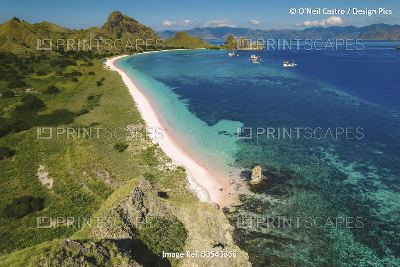 Aerial view of a white sand beach along the shore of Padar Island in Komodo ...