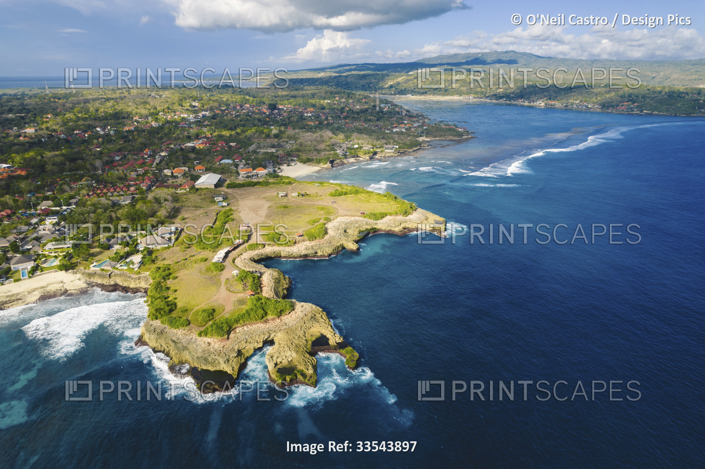 Aerial view of Devil's Tear and the rocky coastline of Nusa Lembongan with the ...
