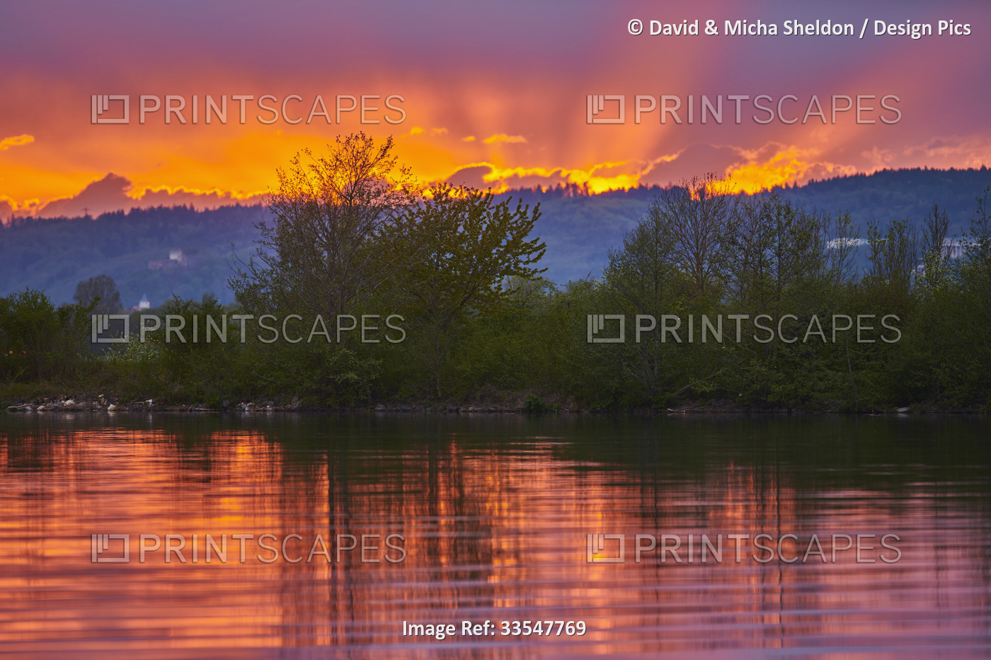 Vibrant colours during sunset over the Danubia River; Upper Palatinate, ...