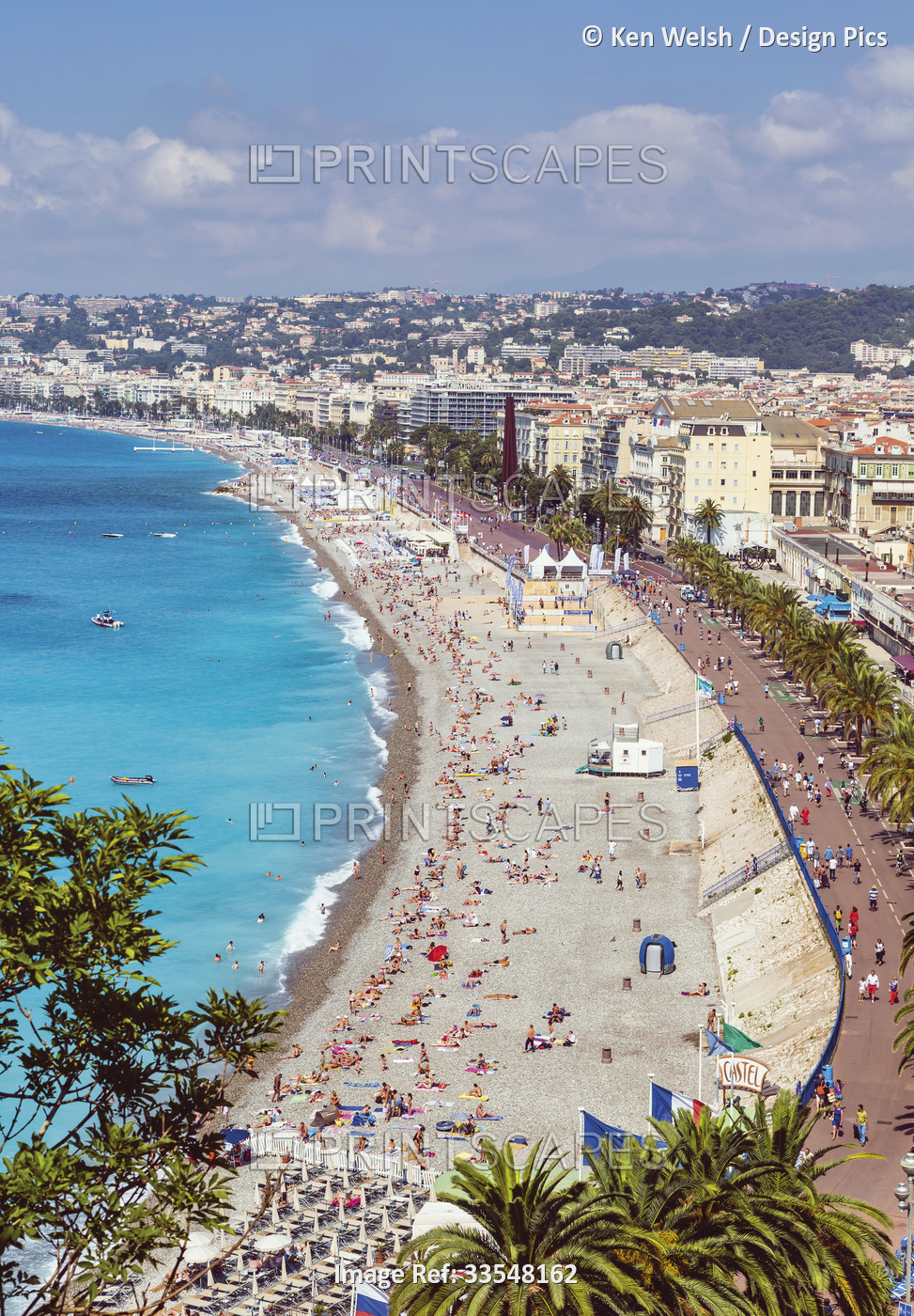 Nice, French Riviera, Cote d'Azur, France. Bathers on the beach in front of the ...