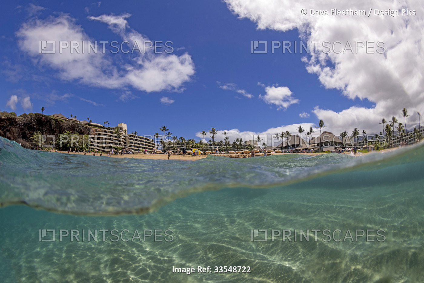 An ocean level split view of the north end of the world famous Ka'anapali Beach ...