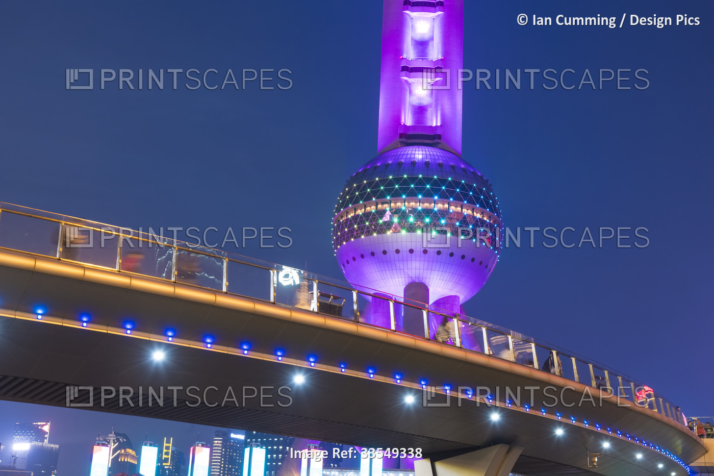 Detail of a pedestrian overpass and the Oriental Pearl Tower at dusk; Shanghai, ...